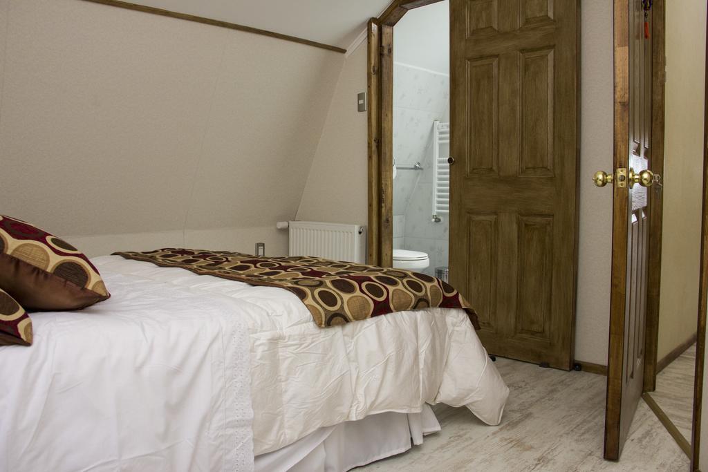 Hostel Entre Vientos Punta Arenas Szoba fotó